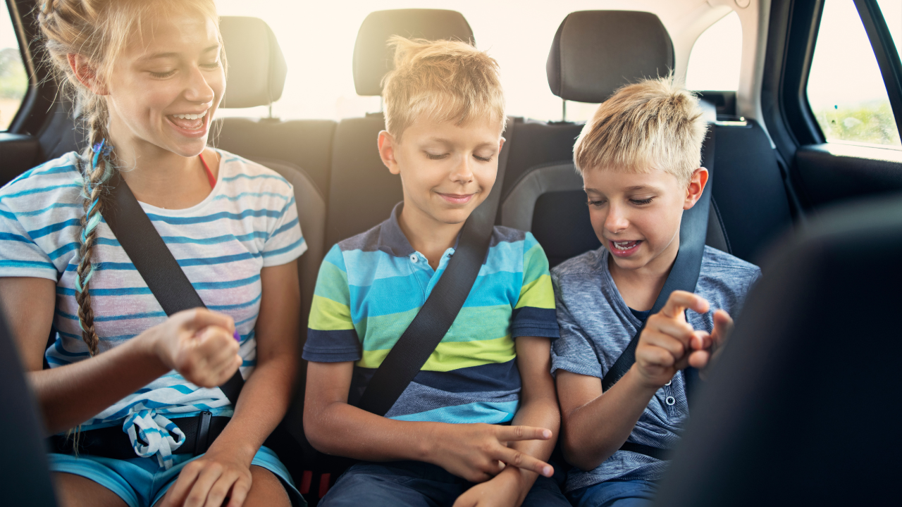 Kids playing games in car